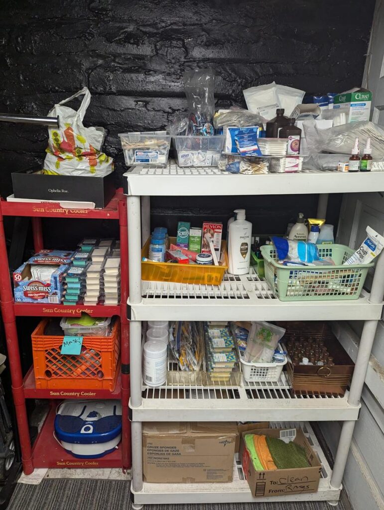 Shelves stocked with hygiene products, food and household supplies